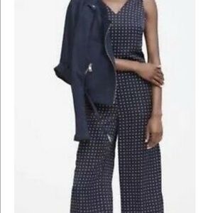 Navy blue polka dot jumpsuit.
